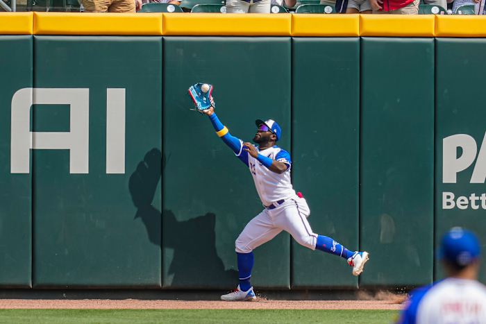 Jun 10, 2023; Cumberland, Georgia, USA; Atlanta Braves center fielder Michael Harris II (23) catches a sacrifice fly ball hit by second baseman Luis Garcia (2) (not shown) during the first inning at Truist Park. Mandatory Credit: Dale Zanine-USA TODAY Sports
